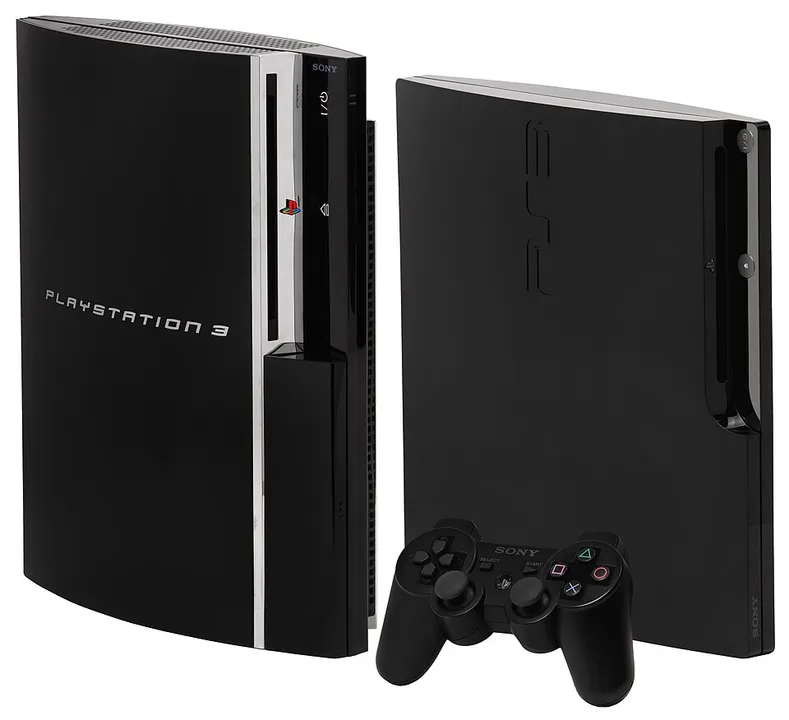 Original PlayStation 3 and Slim consoles beside a controller