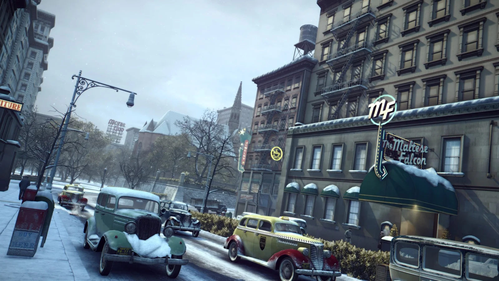 Official Mafia II: Definitive Edition screenshot of a snowy Empire Bay street with 1940s cars