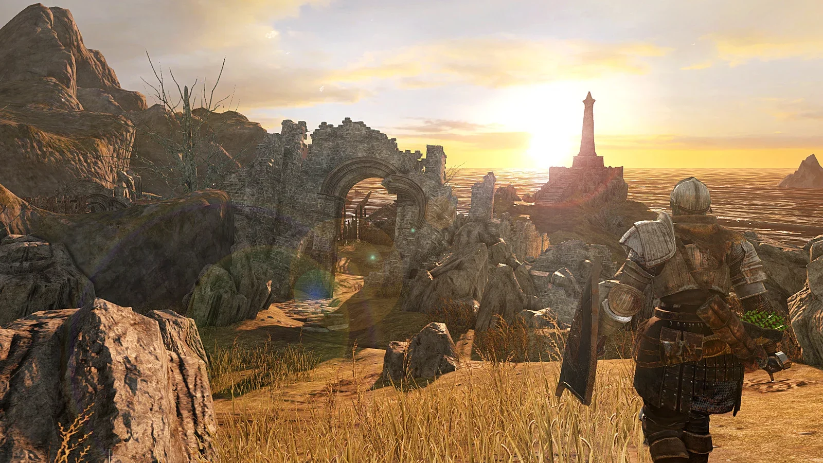An armoured knight with a sword and shield walks along a grassy cliff path towards ruined stone arches and a lighthouse silhouetted against a low sun