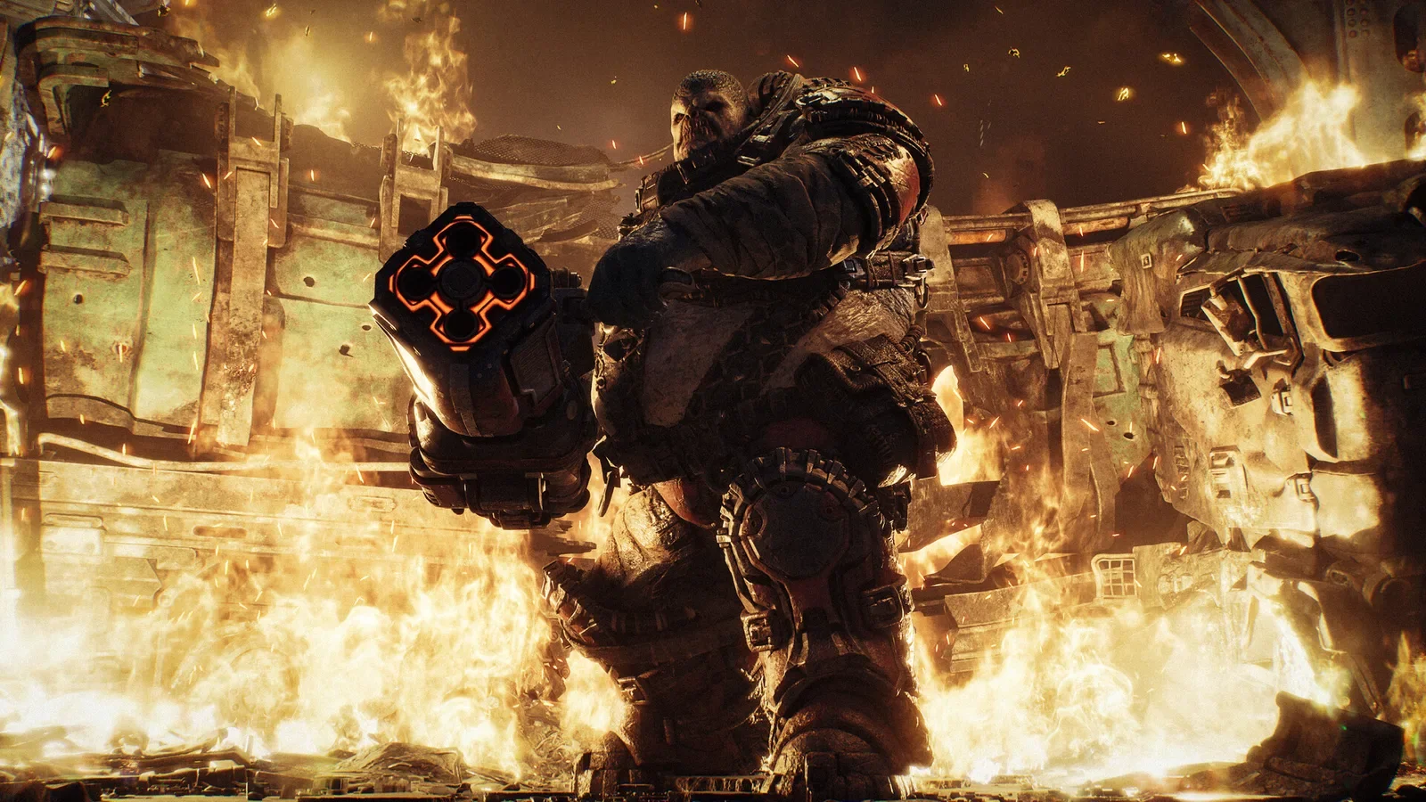 Official Gears of War: E-Day screenshot of an armoured soldier standing in front of a wall of fire