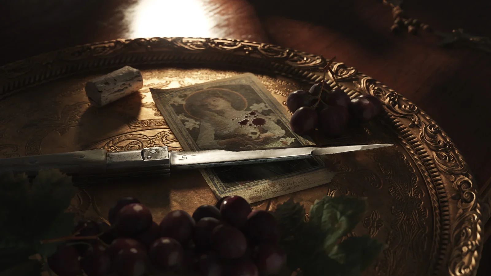Official Mafia: The Old Country screenshot of a stiletto knife and a saint's card on an ornate tray beside grapes
