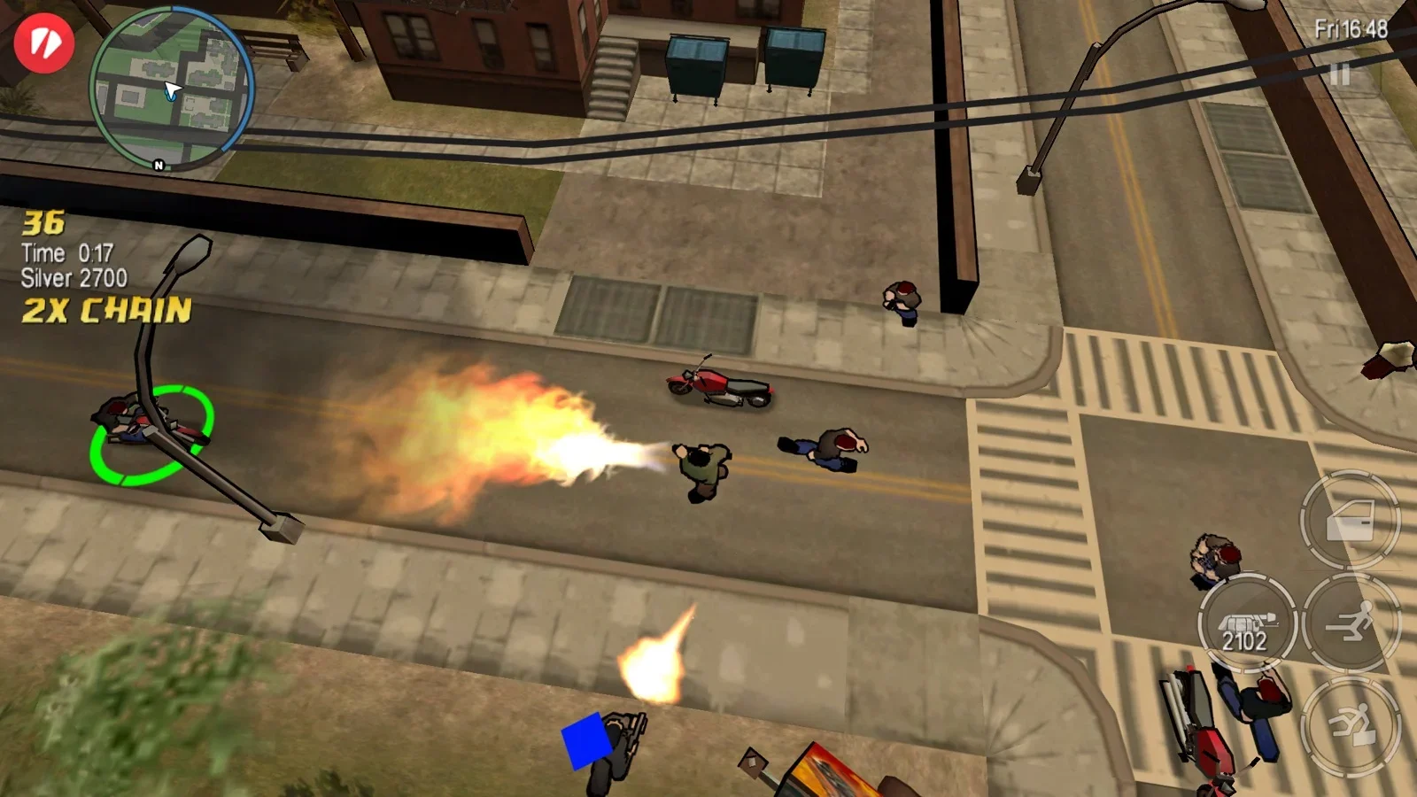 Official GTA Chinatown Wars screenshot of a top-down street shootout in Liberty City from the iOS version