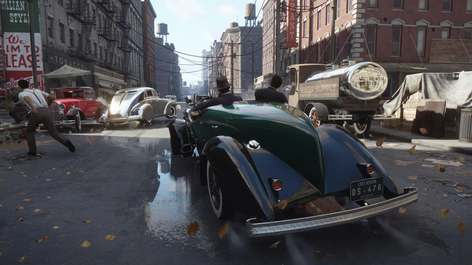 Official Mafia: Definitive Edition screenshot of a 1930s car chase through Lost Heaven