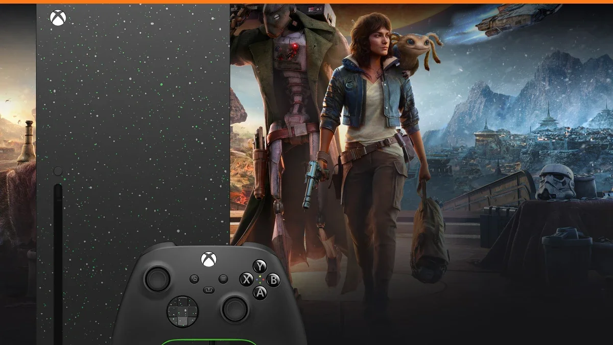 Black Xbox Series X console with a speckled starfield finish and a black controller, beside a woman and a masked alien companion in a desert city