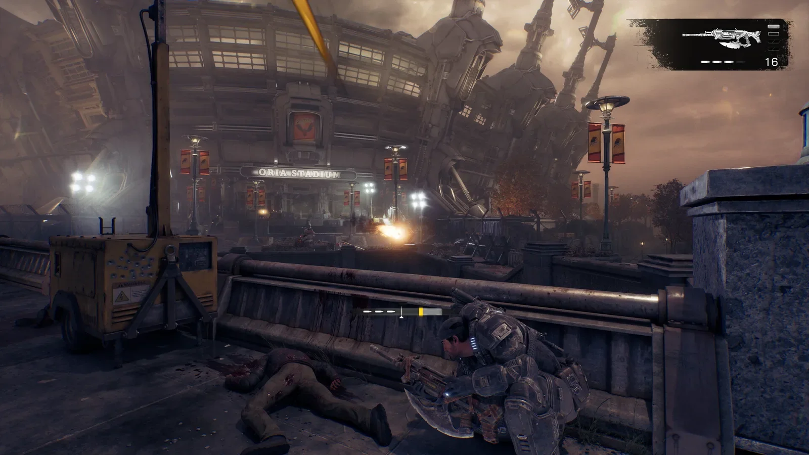 Official Gears of War: E-Day screenshot of a COG soldier kneeling behind a railing in a ruined industrial street