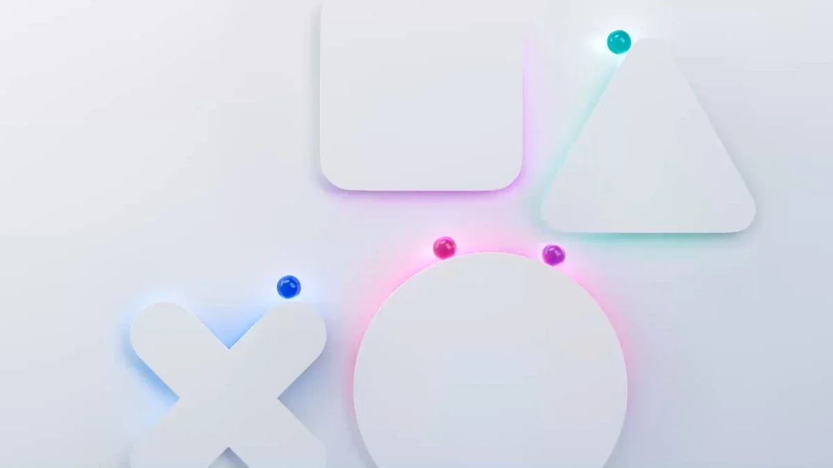 White PlayStation square, triangle, circle and cross shapes with small glowing coloured dots on a pale grey background